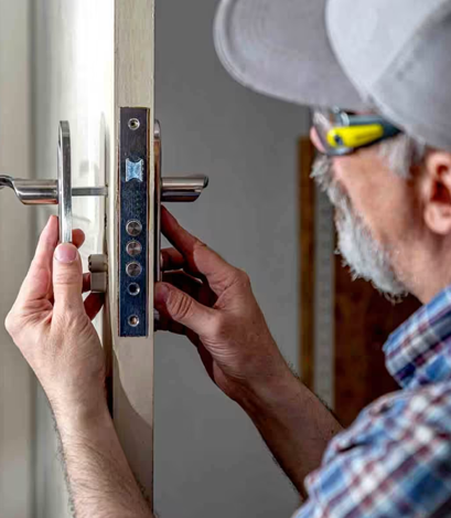 A Man Fixing a Lock